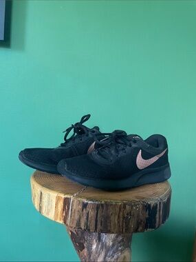Nike Women's Black Running Sneakers with Metallic Pink Swoosh
